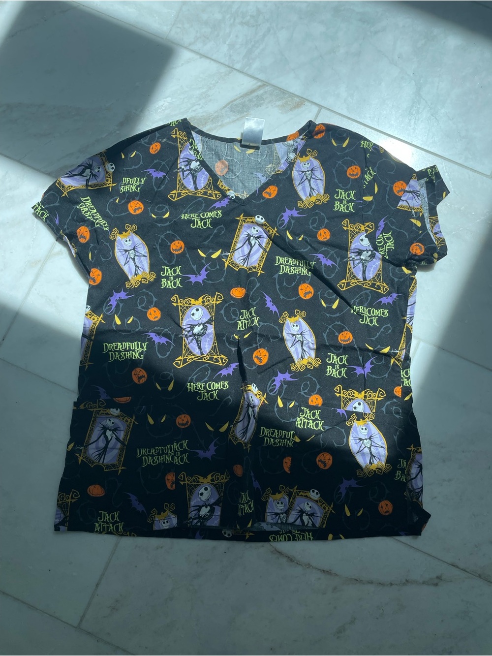 Disney Black Halloween Jack Skellington Scrub Top with Purple and Orange Accents